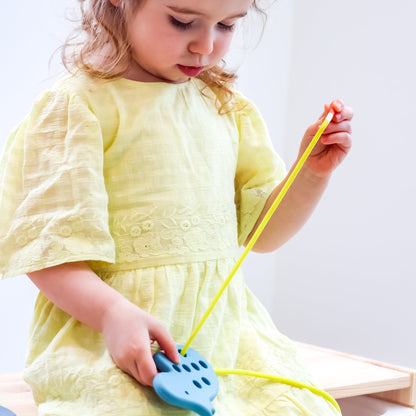 Set of three animal threading toys by Baby Ellor, colorful and safe for children to develop fine motor skills and hand-eye coordination.