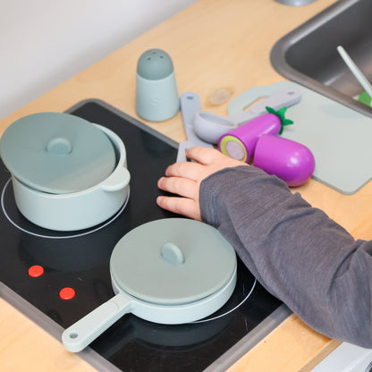 Baby Ellor silicone kitchen play set with colorful utensils, pots, and food toys for imaginative kids' pretend cooking activities.
