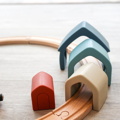 A set of colorful silicone stacking houses in various shades 