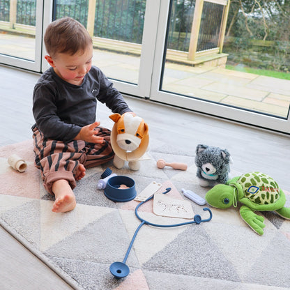 Silicone vet set for children with colorful tools and accessories, designed for pretend play and educational activities.