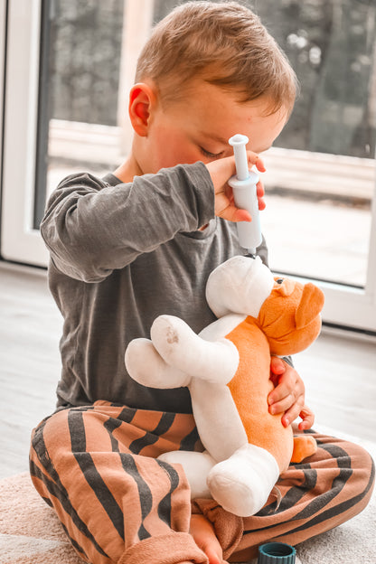 Baby Ellor Store silicone vet set with colorful tools and accessories for pretend play and veterinary role-playing.