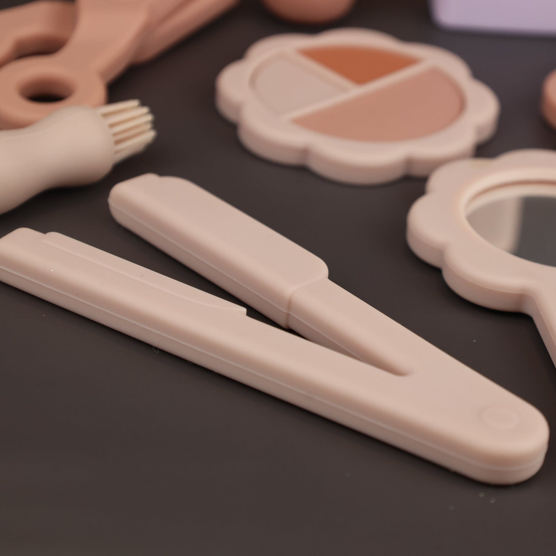 Baby Ellor silicone beauty and hair role play set with 12 toy pieces for imaginative dress-up and pretend play.
