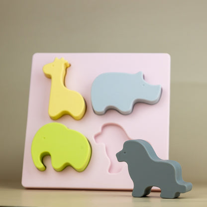Baby Ellor silicone safari shape puzzle with colorful animal-shaped pieces for toddlers' educational play and fine motor skills.