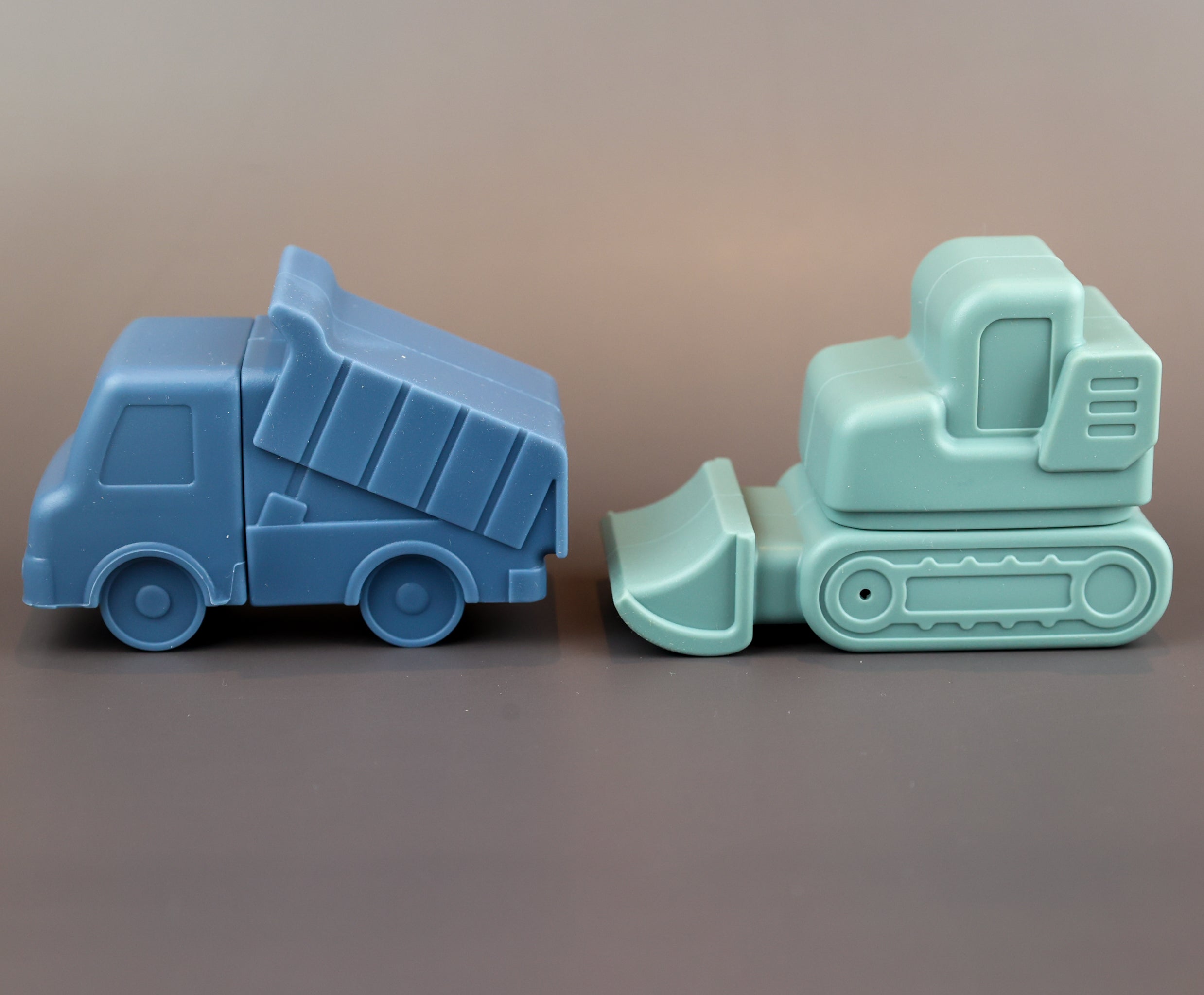 Baby Ellor silicone vehicle bath toy featuring colorful car and boat shapes for fun bath time play.