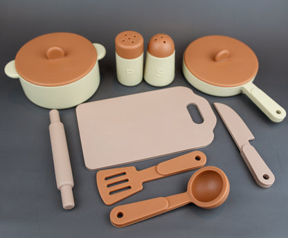 Baby Ellor silicone kitchen play set for children, featuring colorful utensils, pots, and pretend food for imaginative play.