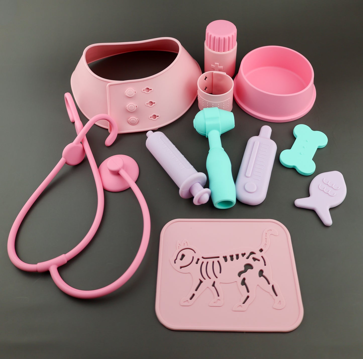 Silicone vets set from Baby Ellor Store with colorful tools and accessories for pretend play and veterinary role-playing.