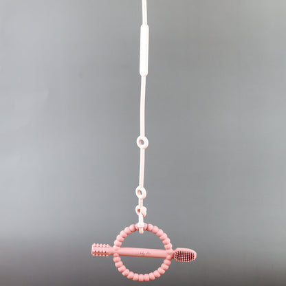 Baby Ellor silicone pacifier strap with clip, featuring a colorful design, attached to a pacifier for easy attachment and safety.