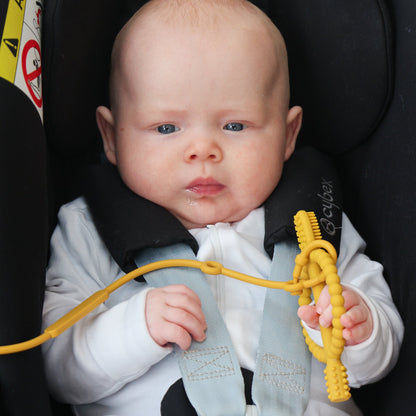 Baby Ellor silicone pacifier strap with adjustable clip and colorful beads for secure, stylish pacifier attachment.