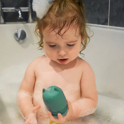 Ellor & Co. Bath Time Bundle with plush towels, bath toys, and skincare products arranged for a relaxing bath experience