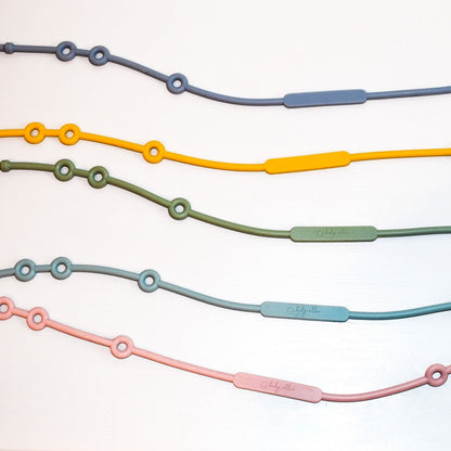 Baby Ellor silicone pacifier strap with adjustable clip and colorful beads for secure, stylish baby accessory.