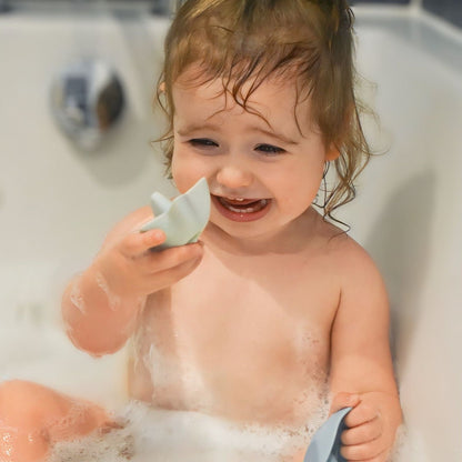 Baby Ellor silicone shark boat bath toy featuring colorful, soft silicone sharks ideal for children's bath time fun.