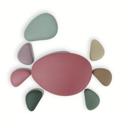 Baby Ellor silicone stacking pebbles, set of 36 colorful, smooth, and flexible silicone pebbles for children’s play and development.