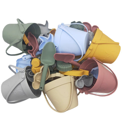 Baby Ellor silicone bucket and spades set with six shape molds, ideal for kids' beach or sand play.