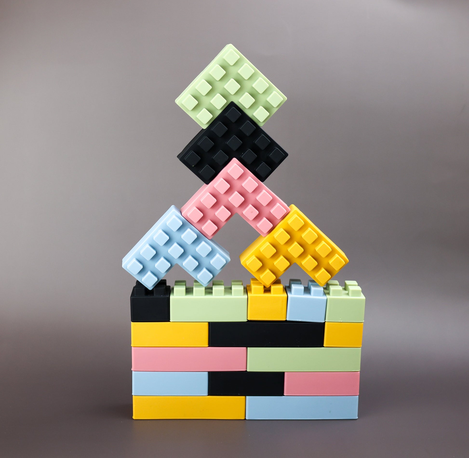 Ellor & Co. Little Builders Bundle with colorful wooden blocks and construction tools for kids' creative play.