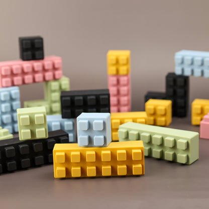 Set of 20 colorful silicone bricks for toddlers from Baby Ellor Store, arranged in a playful stack on a white background.