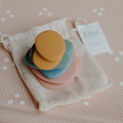 Baby Ellor silicone stacking pebbles toy set with 8 colorful, smooth, stackable silicone pebbles for infants and toddlers.