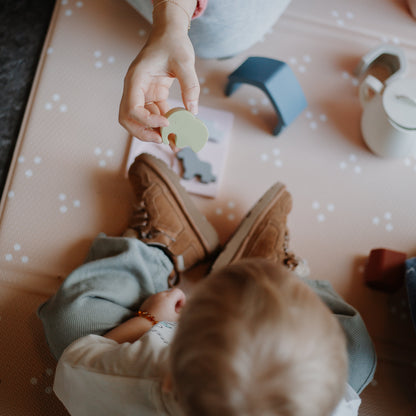 Baby Ellor silicone safari shape puzzle featuring colorful animal-shaped pieces for developmental play and fine motor skills.