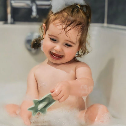 Baby Ellor silicone shark boat bath toy with colorful shark and boat design for kids' bath time fun.