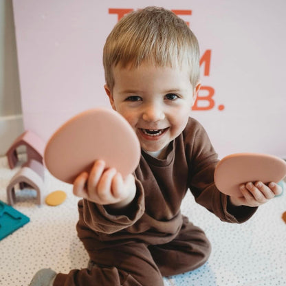 Baby Ellor silicone stacking pebbles toy set with 8 colorful, soft, and safe silicone pebbles for toddlers' play and development.